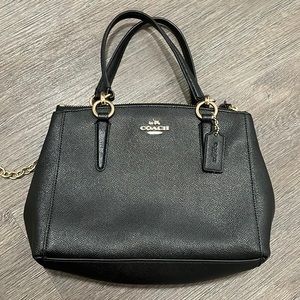 Coach Brand small hand, shoulder bag or cross body bag. Black with gold.
